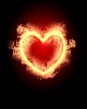 burning heart with flames against dark background