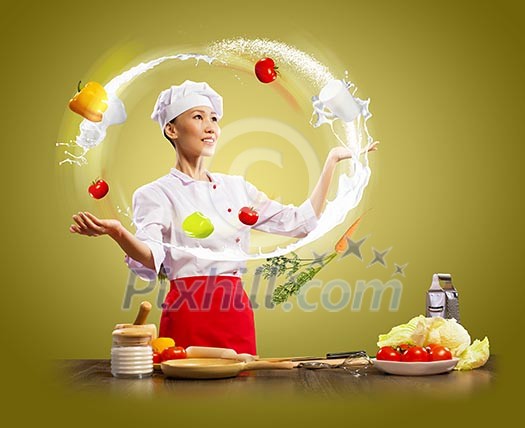 juggler female asian cook against color background juggler female asian cook against color background