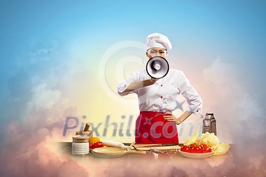 Asian female cook screaming loud in megaphone Asian female cook screaming loud in megaphone