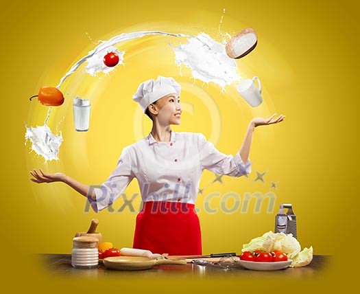 juggler female asian cook against color background