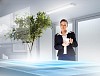 Image of young female ecologist holding cup standing against high-tech picture