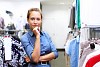 Young girl in a shop buying clothes