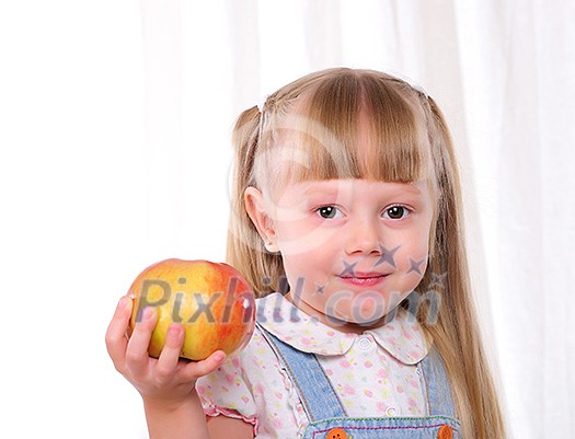 Portrait of a little girl with fruit in their hands. Portrait of a little girl with fruit in their hands.