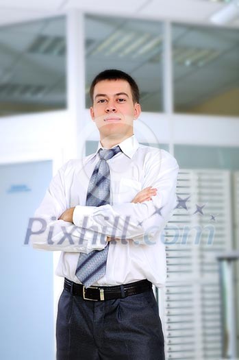 Young business man in the office workplace. Young business man in the office workplace.