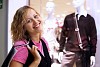 Young woman doing shopping and choosing clothes