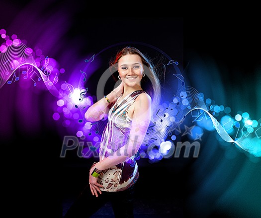young woman dancing at disco or a night club young woman dancing at disco or a night club