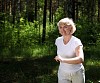 Elderly woman likes to run in the park. Healthy lifestyle