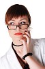 charming brunette business woman in a white jacket with black beads