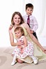 Mom, her son and her little daughter together having fun