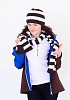 young pretty woman wearing winter hat and scarf
