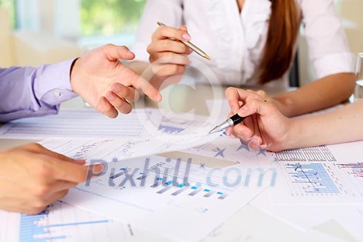 financial and business documents on the table and human hands financial and business documents on the table and human hands