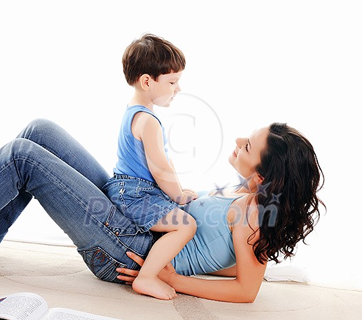 young mother and her son spend time together young mother and her son spend time together
