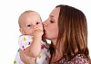 Young mother with little daughter in studio