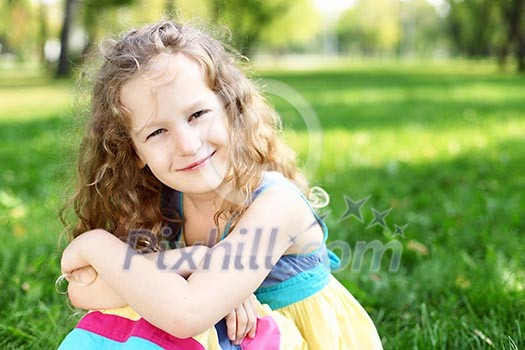 Little happy girl having fun in green summer park Little happy girl having fun in green summer park