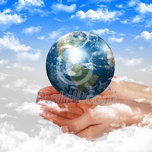 Hands and Earth. Symbol of environmental protection Hands and Earth. Symbol of environmental protection