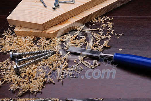 Wood shavings and various construction tools Wood shavings and various construction tools