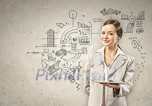 Image of young woman holding in hands ipad Image of young woman holding in hands ipad