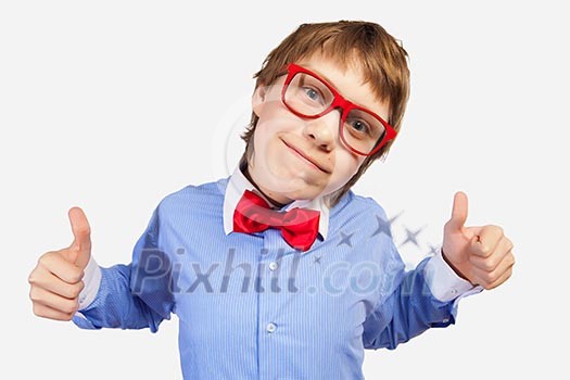 Image of schoolboy smiling showing thumbs up Image of schoolboy smiling showing thumbs up