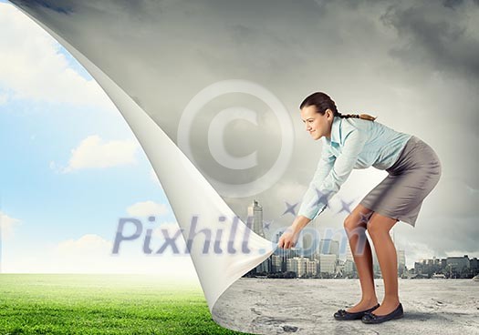 Image of young pretty woman changing reality Image of young pretty woman changing reality