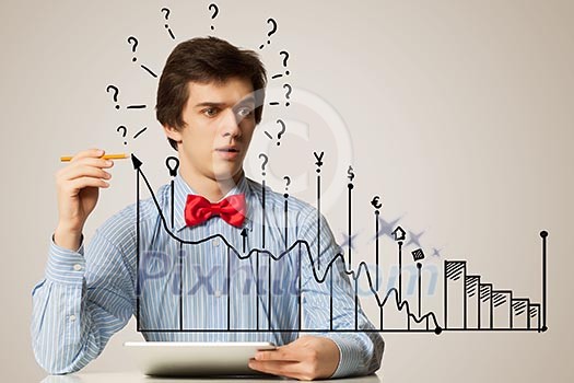Young man sitting at table with laptop. Collage drawing Young man sitting at table with laptop. Collage drawing