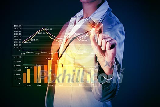 Image of businesswoman in grey suit drawing graph Image of businesswoman in grey suit drawing graph