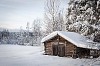 A old barn in a winter landscape