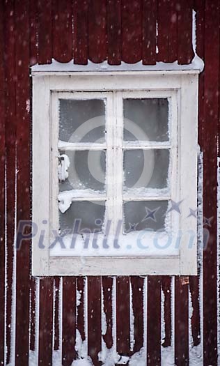 Old window covered in snow Old window covered in snow