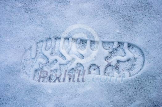 Background of a shoeprint in the snow Background of a shoeprint in the snow