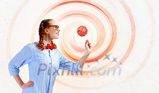 Image of funny lady in red glasses with lollipop Image of funny lady in red glasses with lollipop