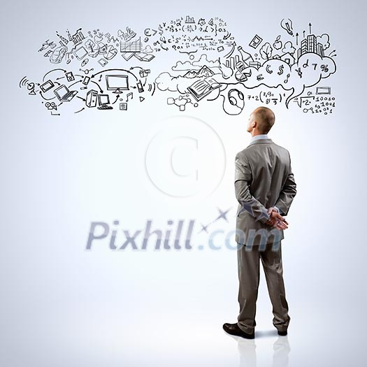 Back view of businessman looking at collage drawing Back view of businessman looking at collage drawing