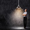 Image of attractive businesswoman against dark background