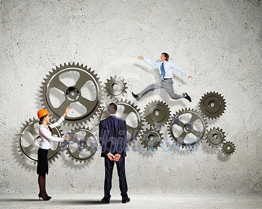 Businessman and businesswoman with cog wheel elements. Organization concept Businessman and businesswoman with cog wheel elements. Organization concept
