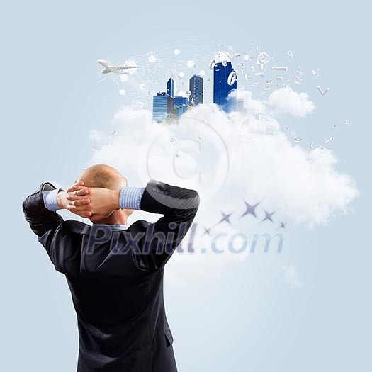 Image of thoughtful businessman standing with back Image of thoughtful businessman standing with back
