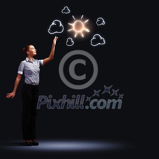 Image of attractive businesswoman against dark background Image of attractive businesswoman against dark background