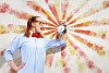 Young woman with an old-fashioned alarm clock