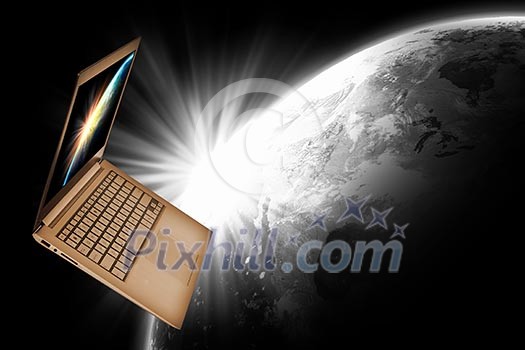 Notebook with our planet earth against black background with globe Notebook with our planet earth against black background with globe