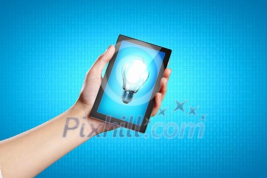 Closeup image of human hands holding ipad Closeup image of human hands holding ipad