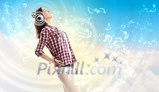 Young girl listens to music. Modulations of color and light. Young girl listens to music. Modulations of color and light.
