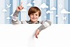 Little boy holding a blank white billboard