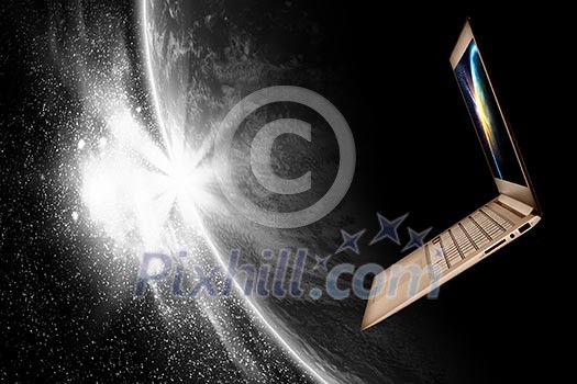 Notebook with our planet earth against black background with globe Notebook with our planet earth against black background with globe