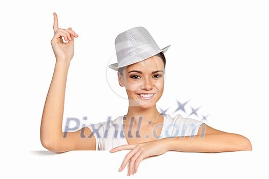 Young pretty woman holding a blank white billboard Young pretty woman holding a blank white billboard