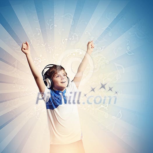 Little cute boy in headphones enjoying music Little cute boy in headphones enjoying music