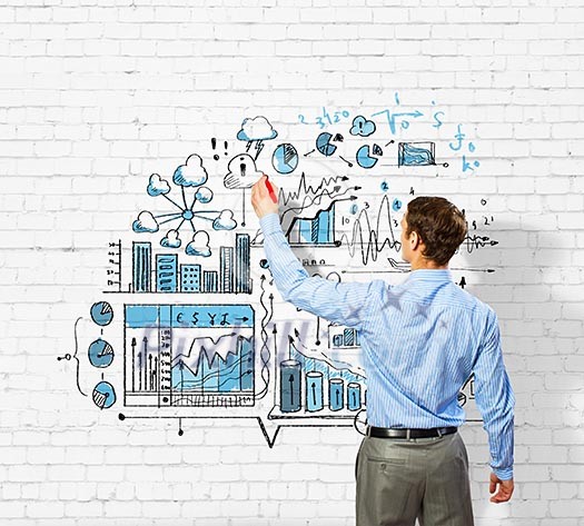 Back view image of businessman drawing sketches on wall Back view image of businessman drawing sketches on wall