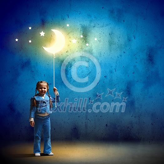 Image of little cute girl with moon on rope Image of little cute girl with moon on rope
