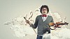 Image of young handsome man playing violin