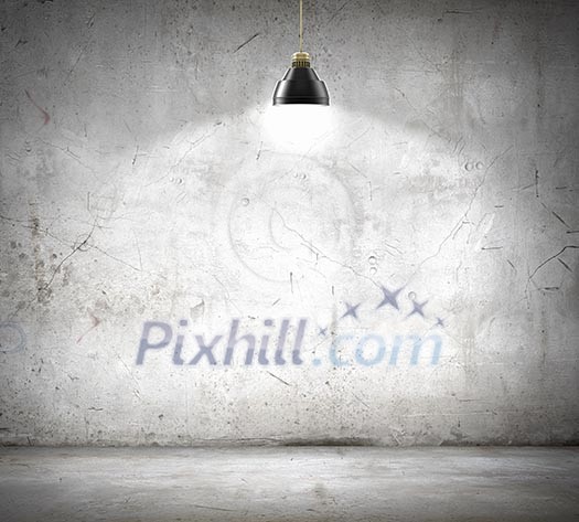 Stone blank wall illuminated with hanging above lamp. Place for text Stone blank wall illuminated with hanging above lamp. Place for text