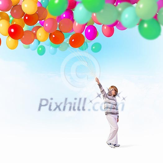 Little cute boy playing with bunch of colorful balloons Little cute boy playing with bunch of colorful balloons