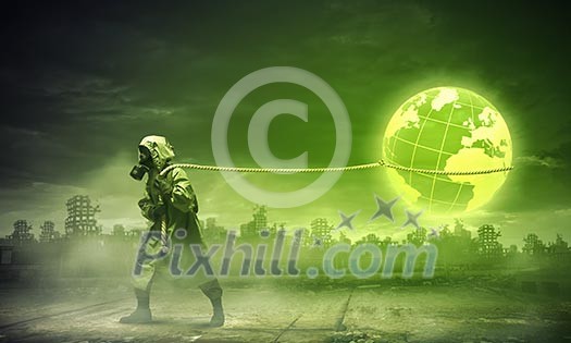 Man in respirator against nuclear background. Global pollution Man in respirator against nuclear background. Global pollution