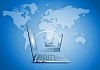 Laptops against globe blue illustration. Globalization concepts