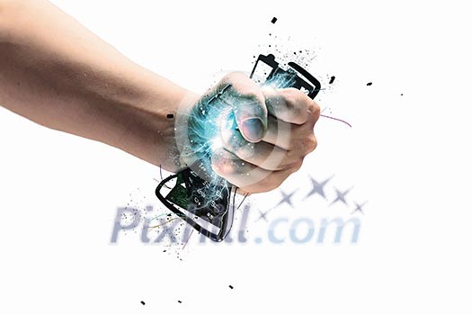 Close-up image of human hand clutching keyboard Close-up image of human hand clutching keyboard